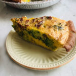 slice of vegetable bacon quiche